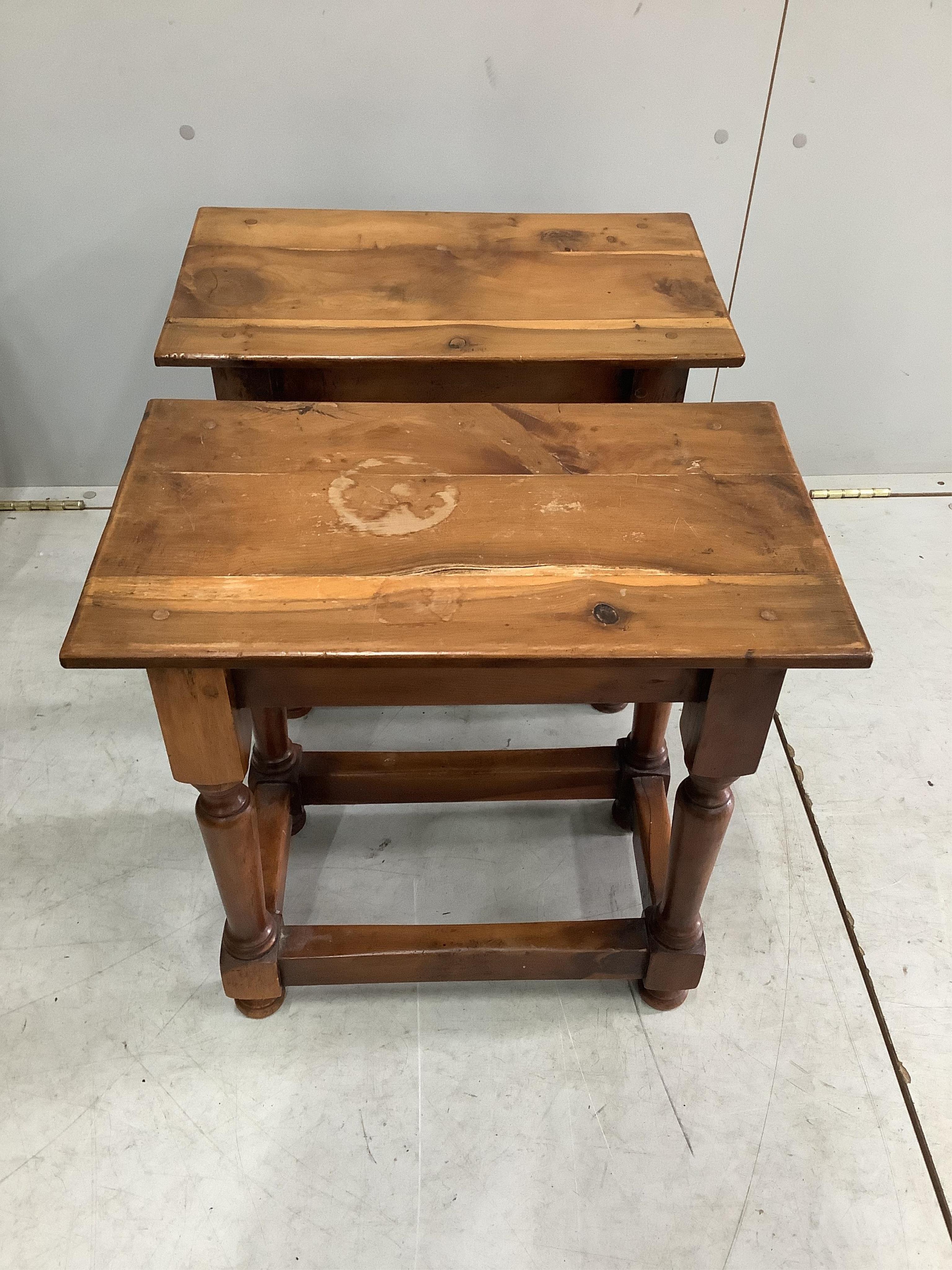 Two mid century wrought iron tiled top coffee tables, larger width 55cm, depth 30cm, height 46cm and a pair of yew joint stools. Condition - fair